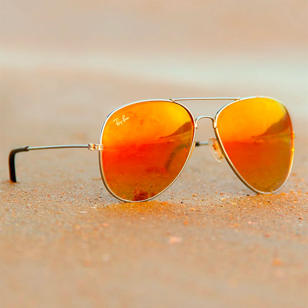 Ray-Ban Avaitor sunglasses on a beach