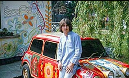 George Harrison at Kinfauns with his psychedelic Mini painted by The Fool